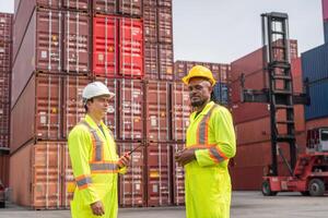 Engineer man Team in Safety Gear at Container Cargo, Foreman Dock Worker Team Inspecting Containers Boxes at Industrial Site photo