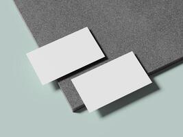 Minimalist white business card placed on a marble background with soft lighting, highlighting its clean design. photo