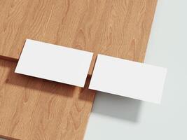 Two business card mockups on a wooden surface with a soft, clean design, perfect for displaying professional and elegant branding concepts. photo