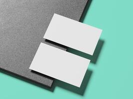 Minimalist white business card resting on a marble surface, creating a professional and clean look. photo