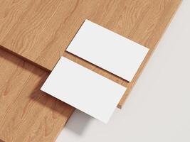A simple business card mockup displayed on a wooden backdrop, designed for showcasing clean and sophisticated logo designs. photo