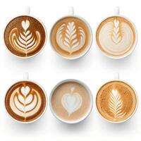 Top View of Coffee Cups with Various Latte Art Designs photo
