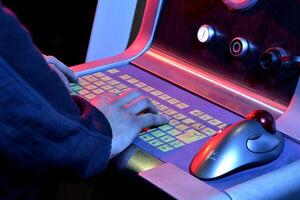 close up view of the hands on the keyboard photo