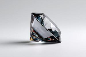 Crystal diamond placed on a smooth surface reflecting colorful light photo
