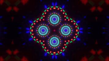 Colorful circular design with many lights on it's sides. Kaleidoscope VJ loop video