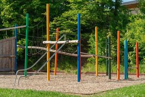Colorful Playground with Slide in a Sunny Park photo