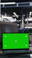Vertical Mockup laptop and computer in data center used in artificial intelligence model deployment. Isolated screen devices in server farm set up to simulate AI environment diagnostics video