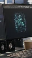 Vertical Close up of artificial intelligence AI development workstation in data center with dual monitors. Server room PCs used for tracking neural network algorithms performance, handheld camera shot video