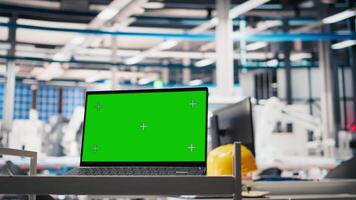 Empty desk with copy space display on pc assists in solar panel factory, manufacturing process in the production line at the solar cell plant. Sustainable solutions for cheaper energy. video