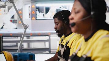 Helpline assistant troubleshoots errors in solar production systems, technician provides support for photovoltaic malfunctions or technical issues in renewable energy factory. Camera A. video