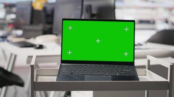 Isolated copy space display on laptop in solar cell manufacturing plant, solar power engineering for sustainable solutions and cheaper energy. Empty desk in a high tech factory. video