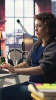 Vertical Admin writing code and doing maintenance on artificial intelligence neural networks computerized model. Woman tech support expert doing checkup on AI systems, data science. Camera A. video