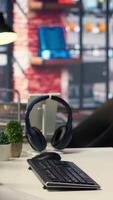 Vertical Empty desk for an expert technician with advanced computing visuals, including a notes tree and AI brain patterns reflecting innovation in cybernetics, neural networks and big data mining. video