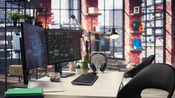 Administrative workspace in an empty IT agency with visual coding and cognitive computing on pc. Screen reflecting advancements in artificial intelligence and information systems. video