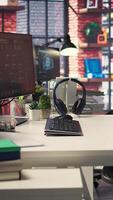 Vertical Digital workstation features multiple PC monitors running artificial intelligence and deep learning code. Empty high tech space supports cloud computing, data science and self learning systems. video
