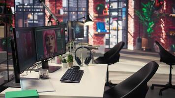 Organized creative workspace for graphic designers and photographers, featuring a dual monitor setup with digital editing tools. Photo editor software and AI chat bot for content creation. video