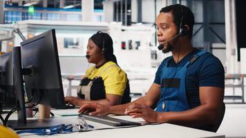 Engineer provides technical support via headset in solar panel factory, operator assists customers with solar equipment issues. Ensuring efficient communication on the helpline. Camera B. video