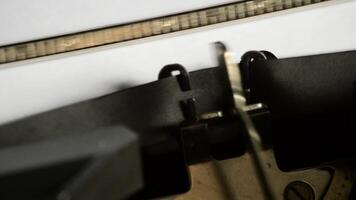 Typing the expression Hurry Up with an old manual typewriter video