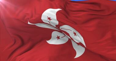 Hong Kongonese flag waving at wind in slow with blue sky, loop video