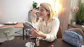 Creating flawless beauty looks in a cozy workspace setting with a touch of elegance video