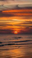 A person is flying a kite on the beach photo