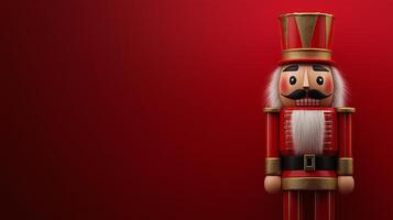 A red and gold nutcracker stands on a red background photo