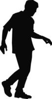 silhouette of a man walking with his hands in his pockets vector