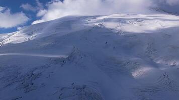 Glacial ice fields on Elbrus with visible crevasses and ridges video