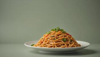 Savory spaghetti dish on a white plate. photo