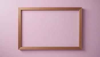 Empty gold picture frame against a pale pink background. photo