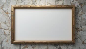 Empty gold-framed picture on a textured surface. photo