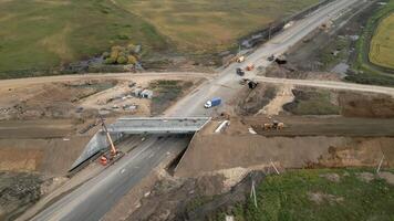 Highway overpass bridge construction progress montage. Clip video