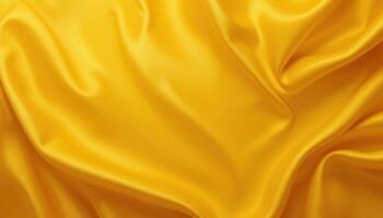 Close-up view of a rich golden yellow fabric draped in folds. photo