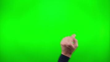 Hand swiping left, right, touching, pressing, sliding on green background, chromakey. Potential use of smartphone, tablet or touch screen. Interface concept video