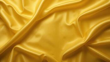 Rich folds of golden silk fabric. photo