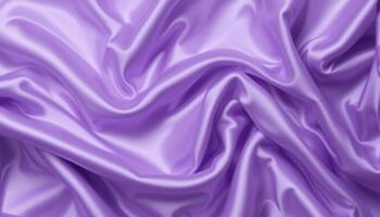 A close-up view of draped, lustrous purple fabric. photo