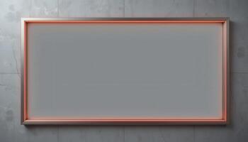 Empty rectangular frame with a light peach border against a gray wall. photo