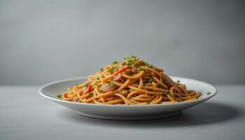 Delicious pasta dish on a white plate. photo