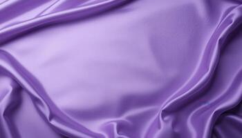 Close-up view of flowing, luxurious purple fabric. photo