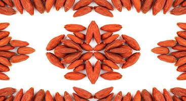 Goji berries are arranged in a circular pattern photo