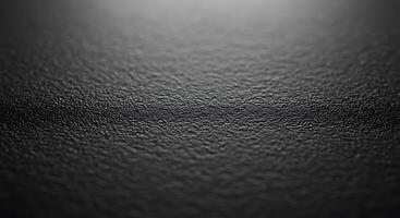 Black background with a shiny surface photo