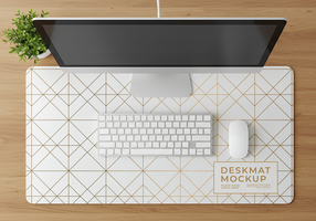 A minimalist desk setup with a geometric deskmat computer keyboard and mouse psd