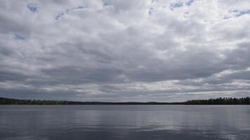 cloudy sky clouds timelapse background and forest lake video