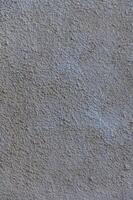 Textured neutral wall with subtle variations in tone and depth creates an abstract backdrop for artistic expression 1 photo