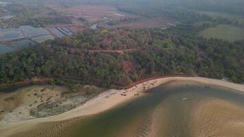 Aerial view of Goan coast with forest, fortress, and beaches video