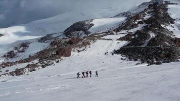 Climbers navigating the snowy slopes of Elbrus mountain video
