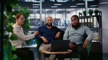 Corporate meeting where multicultural partners collaborate through call, applying strategic thinking and teamwork to align goals and support career and company success. Camera A. video
