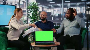 Multiethnic group using strategic thinking and copy space in startup lobby, negotiation during a meeting to reach business goals. Corporate office life with emphasis on leadership. Camera A. video