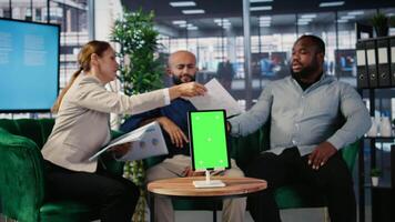 Confident CEOs group planning business development with isolated screen, analyzing performance and implementing decisions through structured analysis and leadership skills. Camera A. video