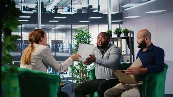 Multiethnic professionals in a heated argument during corporate negotiation, addressing leadership dynamics and disagreements. Irritated business development within a diverse culture. Camera A. video